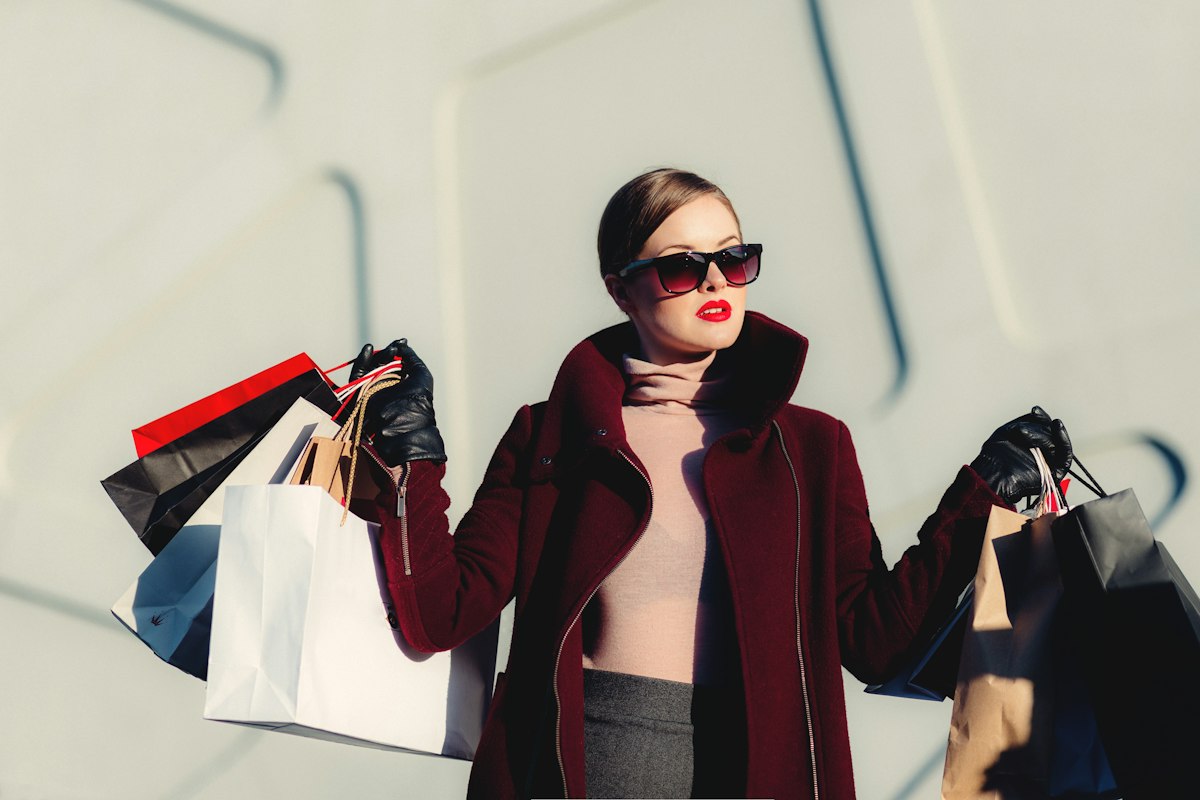 Happy shopper with shopping bags
